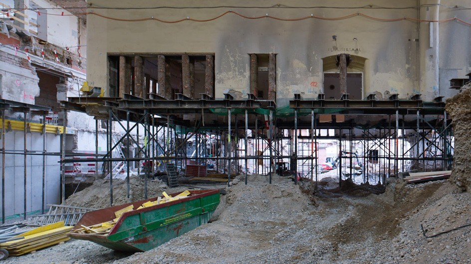 Excavation work around the supported historic wall